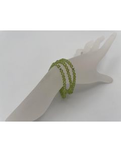 Wrist band, olivine-peridote (faceted) and real silver sphere, 4 mm spheres, 1 piece